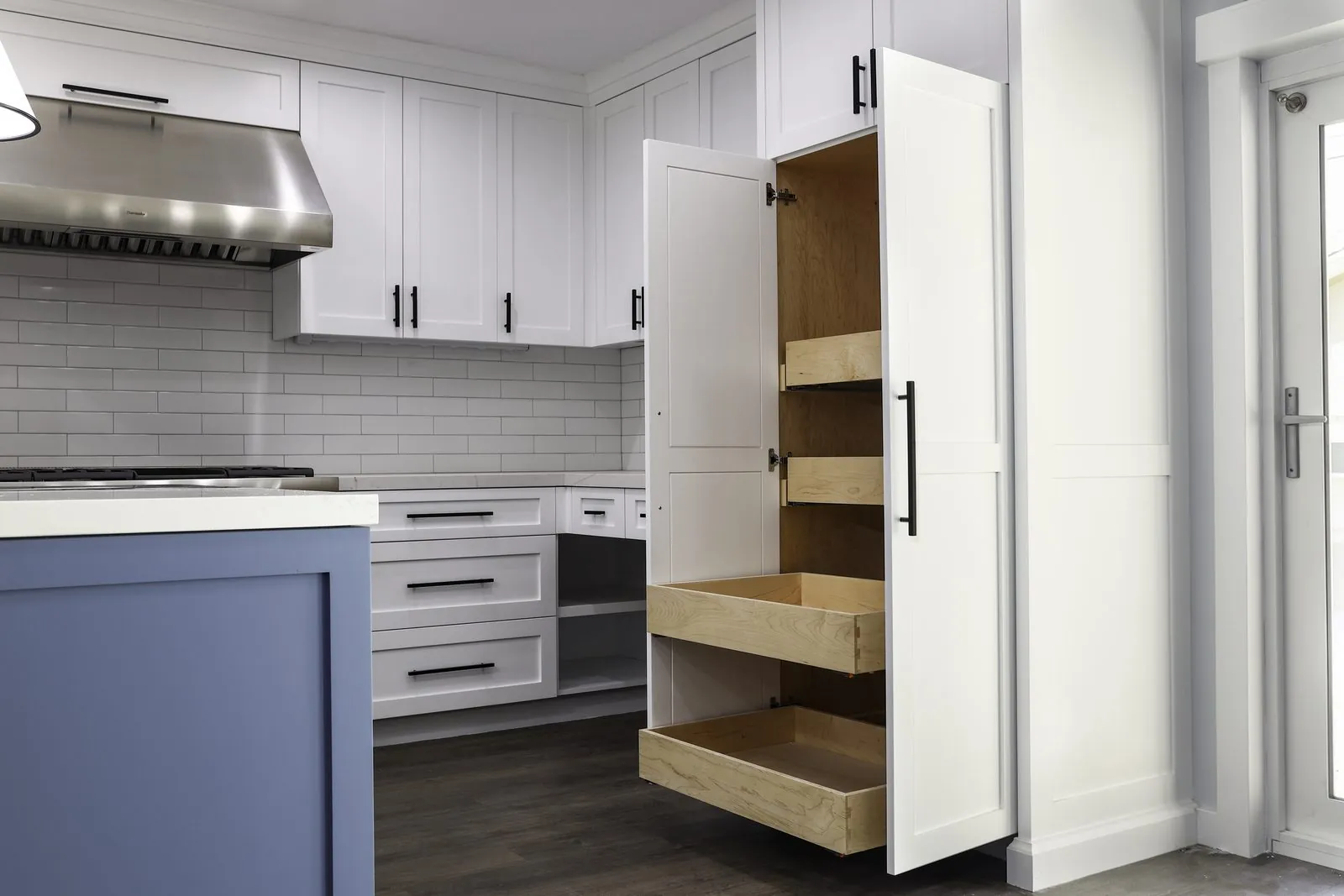 Floor-to-ceiling pantry cabinet with pull-out shelves